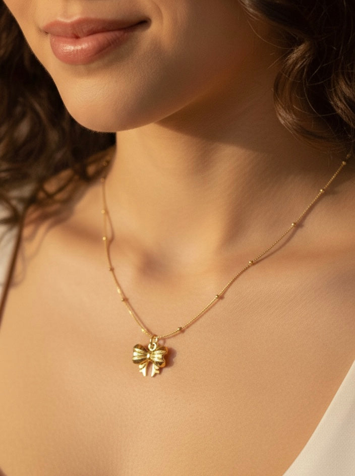 Gold Micky Bow Pendant Necklace