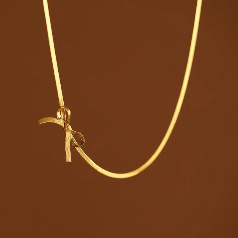 Snake Chain Twisted Bow Necklace